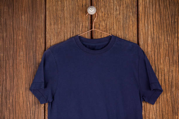 istock Navy blue t-shirt on hanger 653991114