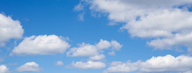 istock Panorama of a light blue sky with clouds. 653991510