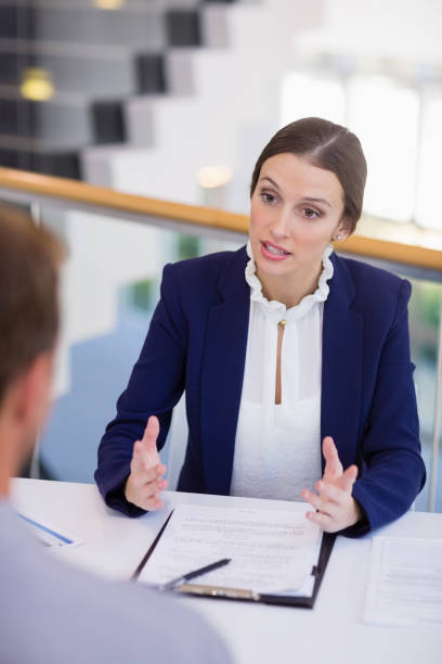 istock Business executives having a discussion at desk 653991796