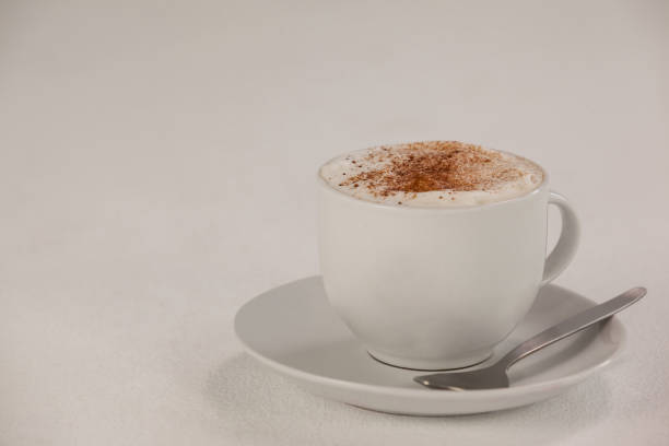istock Cup of espresso coffee with saucer and spoon 653997448