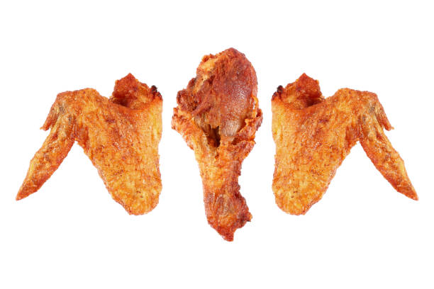 istock deep fry chicken wings and thigh isolated on white 654003440