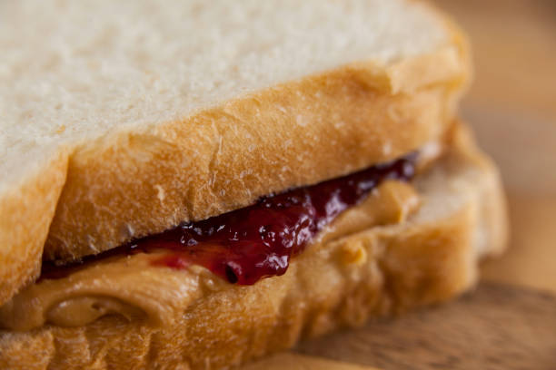 istock Bread sandwich with jam and peanut butter 654005952