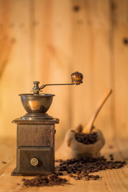 istock Manual coffee grinder and  coffee bean on  wooden surface 654006938