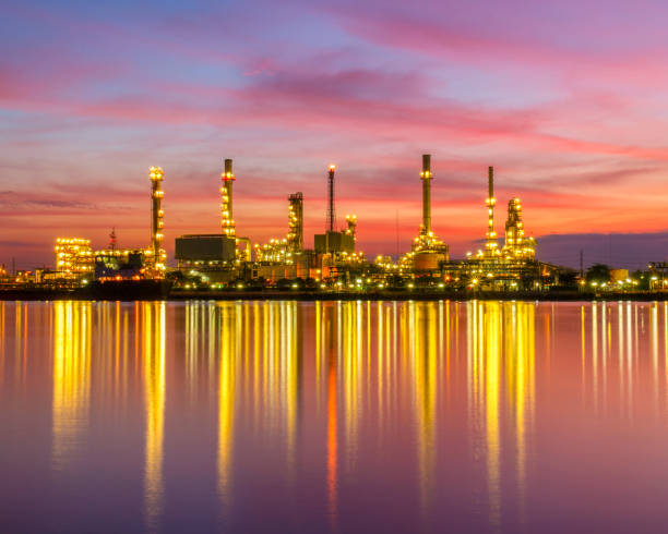 istock Oil refinery along the river at Dusk (Bangkok, Thailand) 654013084