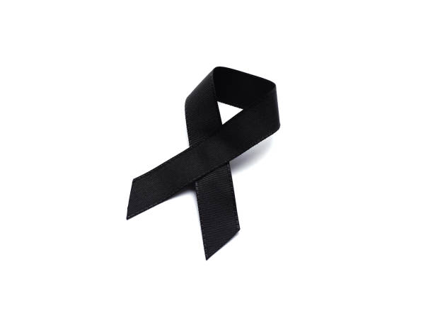 istock Black ribbon for mourning on white background 654036176