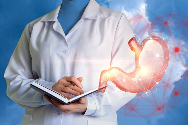 istock The doctor explores the human stomach. 654036288