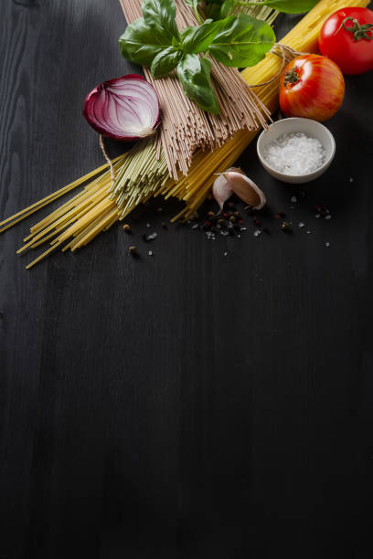 istock Ingredients for cooking pasta Bolognese. Spaghetti, Parmesan che 654036514
