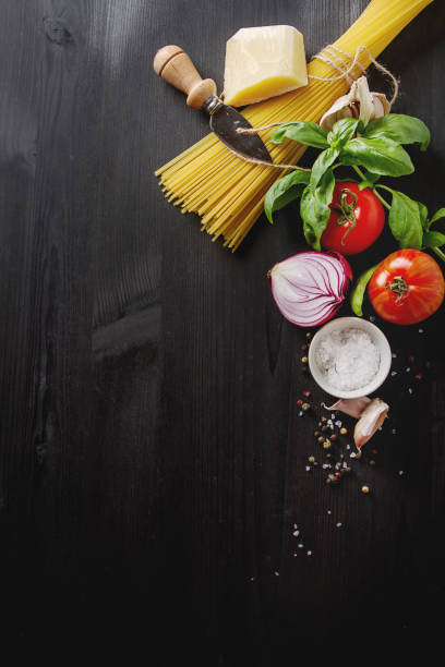 istock Ingredients for cooking pasta Bolognese. Spaghetti, Parmesan che 654036540