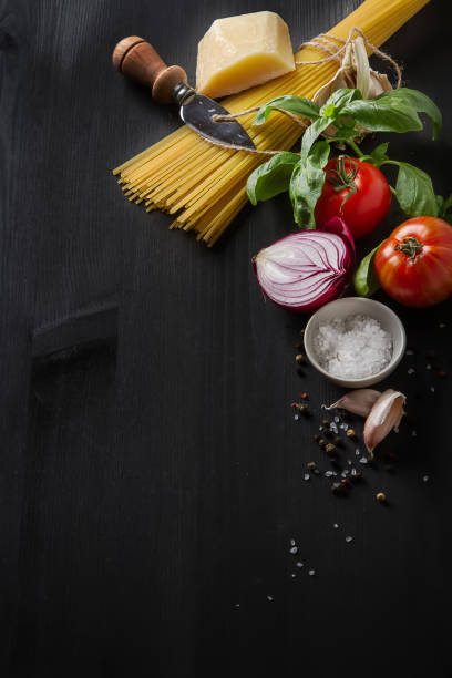 istock Ingredients for cooking pasta Bolognese. Spaghetti, Parmesan che 654036542