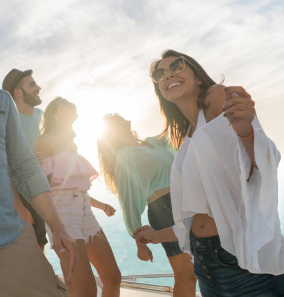 istock Group of people partying on a yacht 654041714