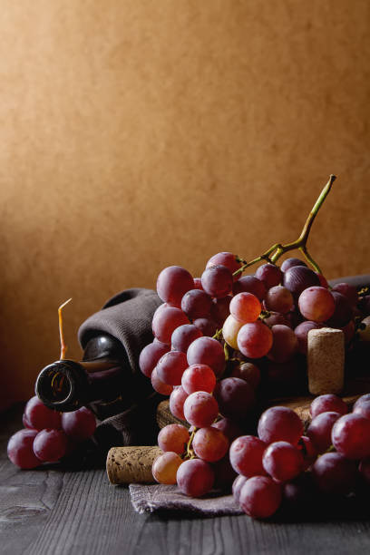 istock Grapevine on a wooden board. French vineyard. 654044578