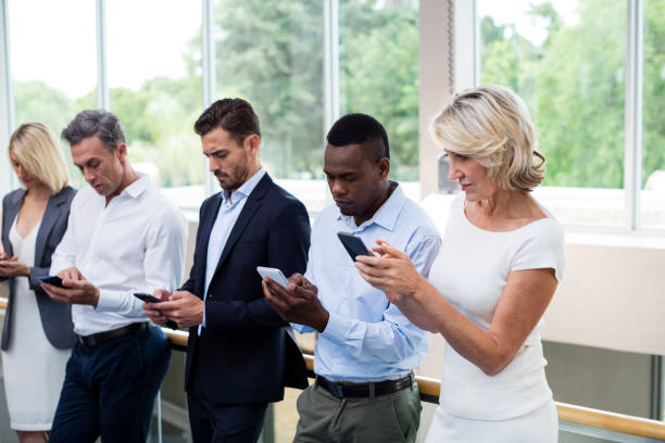 istock Business executives using digital tablet and mobile phone 654049560