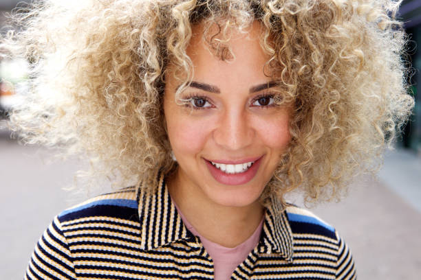 istock Young african american woman smiling 654054656