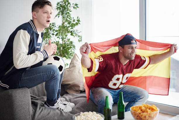istock Male fans soccer fan watching game 654058976