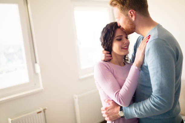 istock Couple moving into their new home 654062606