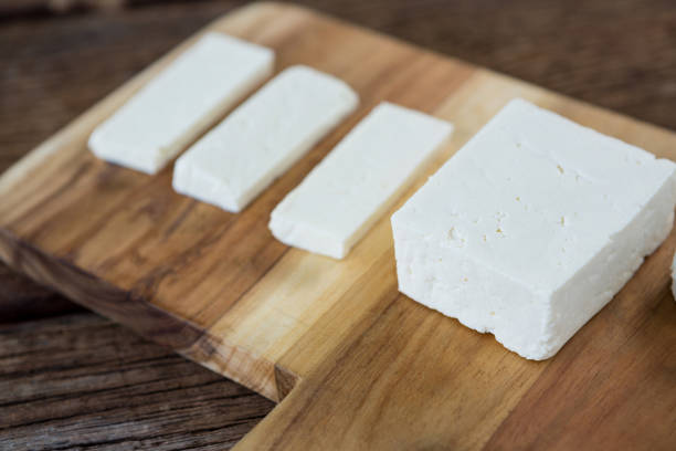 istock Goat cheese on wooden board 654063030