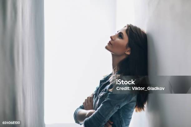 Portrait Of Tired Beautiful Woman Stock Photo - Download Image Now - Sadness, Contemplation, Only Women