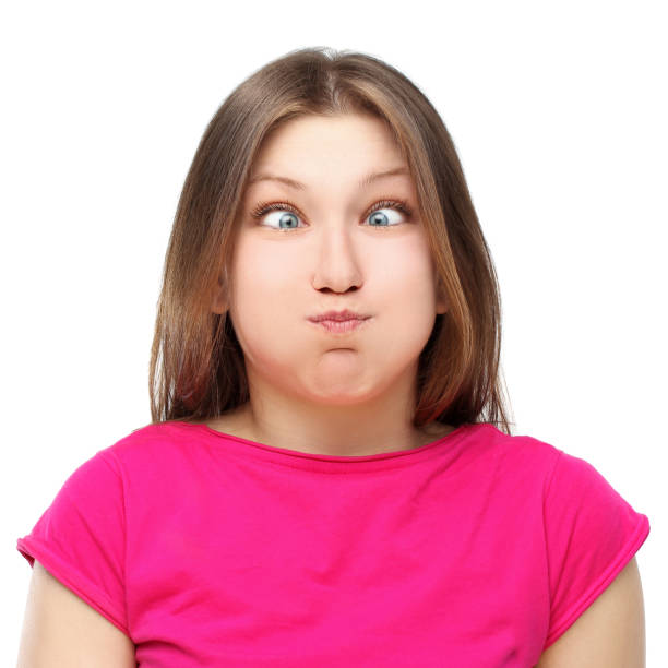istock Goofy young woman making a grimace. 654068864
