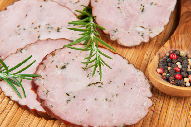 istock Sausage with wild garlic on a bamboo mat 654069120