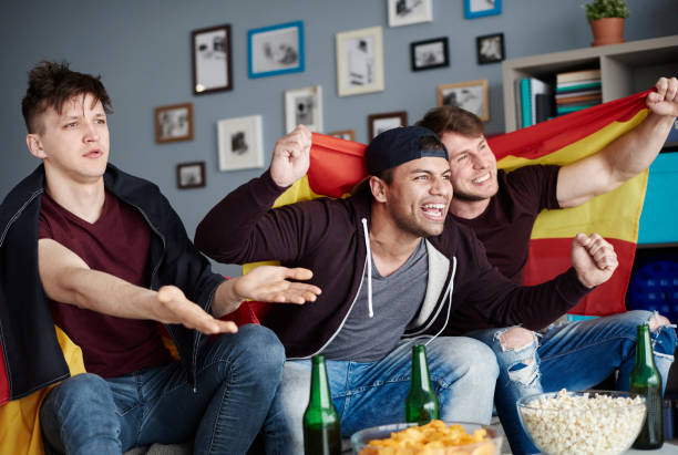 istock Two against one in the living room 654072186