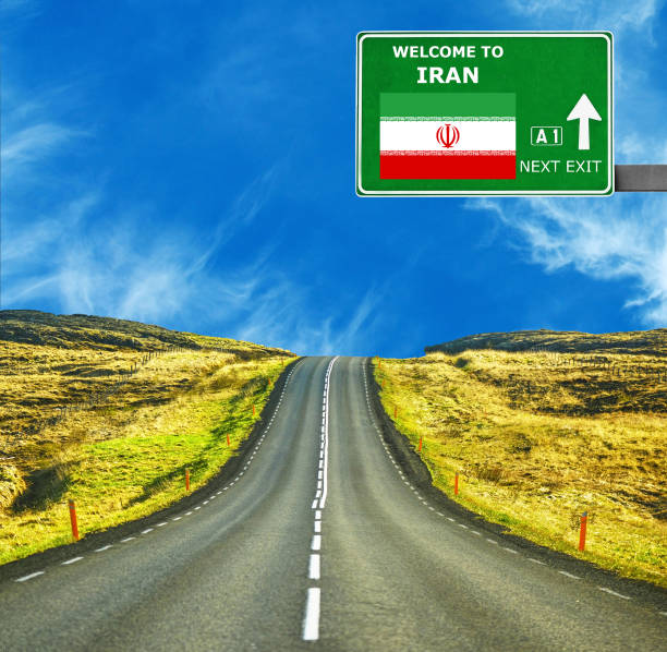 istock Iran road sign against clear blue sky 654072980