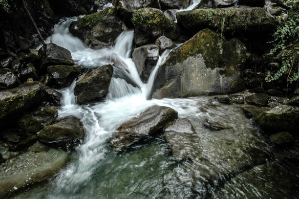 istock Water running downstream on a river in the Andes 654073600