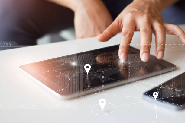 istock Businessman using tablet and smartphone with global network worldwide connection technology on virtual screen 654078992