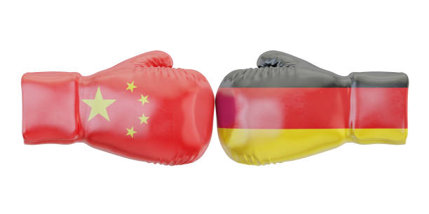 istock Boxing gloves with Germany and China flags. Governments conflict concept, 3D rendering 654079740
