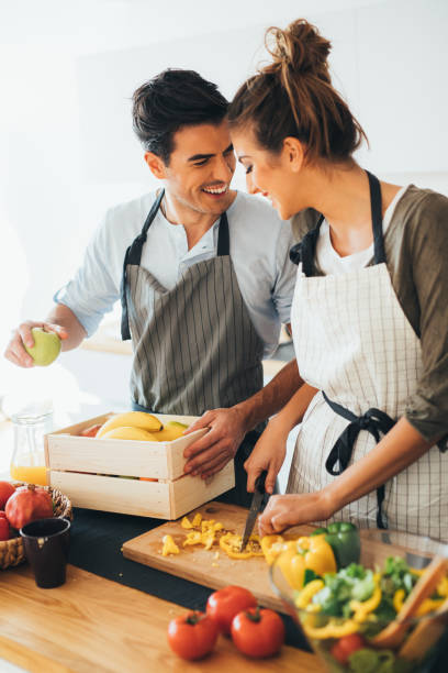 istock Young couple cooking in the kitchen 654084806