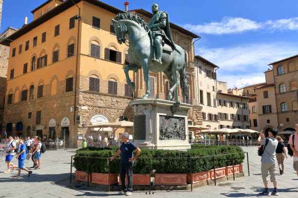 Equestrian statue of Cosimo de Medici in Florence, Italy . Florence, Italy - August 19, 2015: Tourists near Equestrian statue of Cosimo de Medici in Piazza della Signoria Cosimo stock pictures, royalty-free photos & images