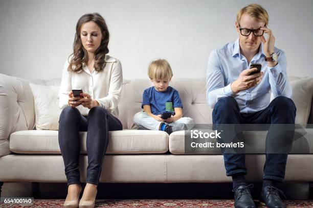 Family Problems Stock Photo - Download Image Now - Addiction, Telephone, Mobile Phone