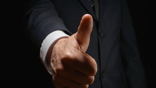 istock Businessman show a gesture LIKE by hand 654100214