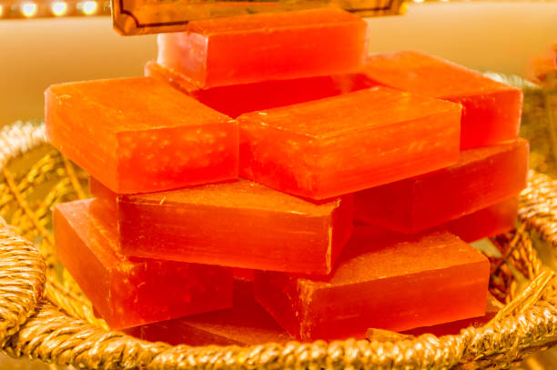 istock Closeup of solid colorful hand made soap bars in a basket 654103180