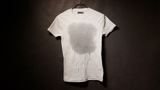 Wet gray T-shirt on a black background