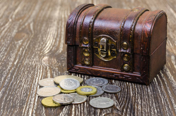 istock treasure chest with coins, rare finds. 654110986