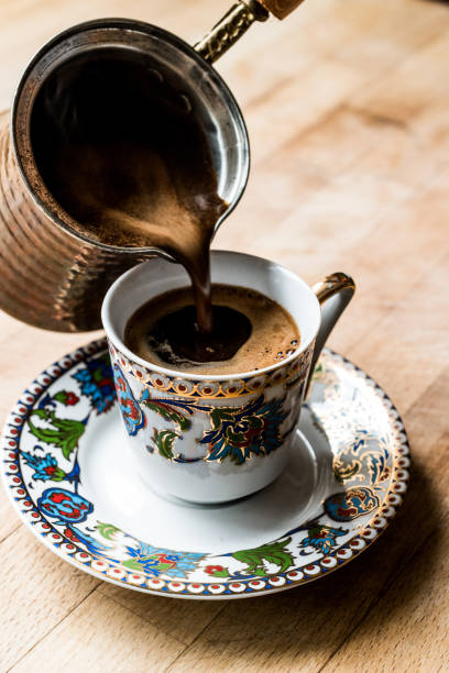 istock Pouring Turkish Coffee into the cup. 654117498