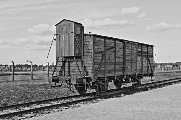Deportation wagon at Auschwitz Birkenau concentration camp stock photo