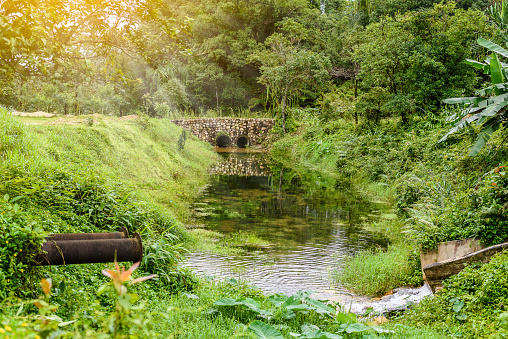 Stone bridge and waterway in old mines at 