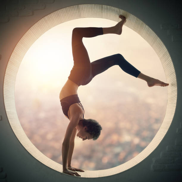 istock Young woman doing yoga 654127972
