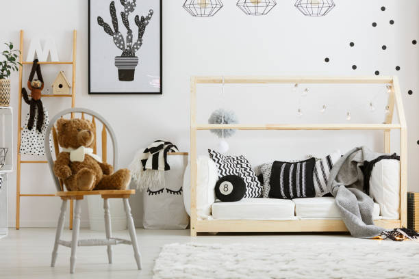 istock Boy bedroom with house bed 654140018
