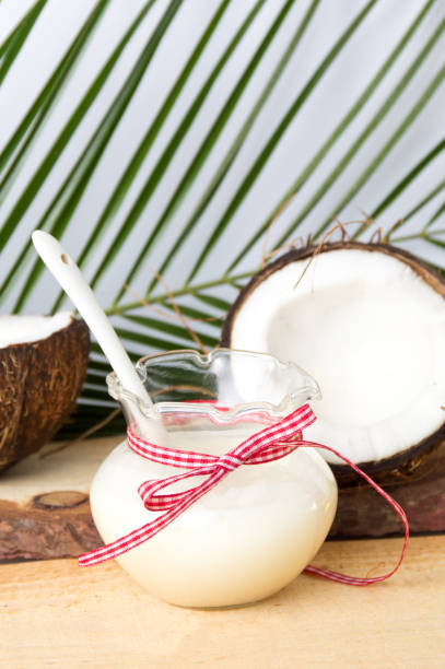 istock Coconut fruit and milk in a bottle 654141480