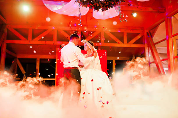istock Wedding dance in restaurant with varioius lights and smoke 654142936