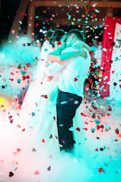 istock Wedding dance in restaurant with varioius lights and smoke 654147132