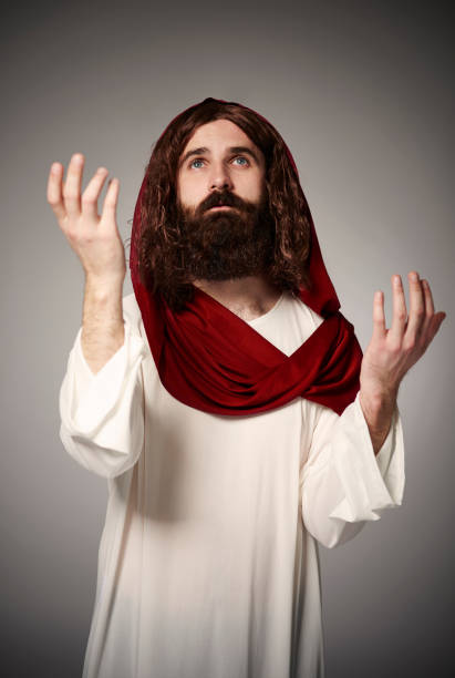 istock Jesus Christ praying to the Holy God 654151956
