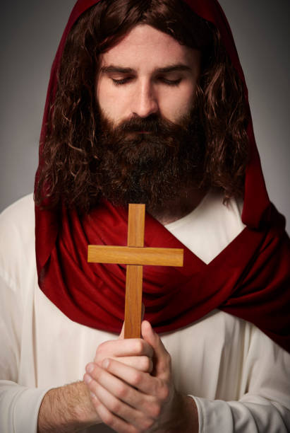istock Son of the God with religious symbol 654153140