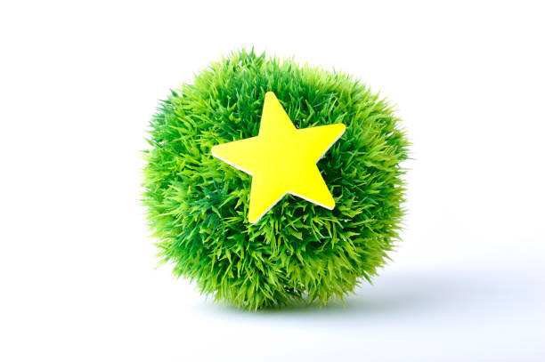istock Sphere made of artificial turf and the stars 654157100