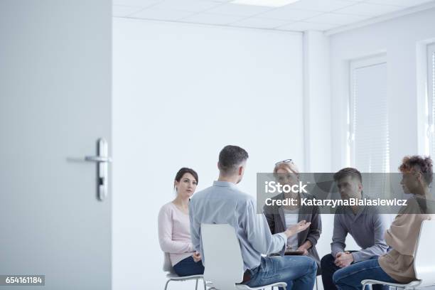 Group Therapy For Ptsd Stock Photo - Download Image Now - Psychotherapy, Alternative Therapy, Group Of People