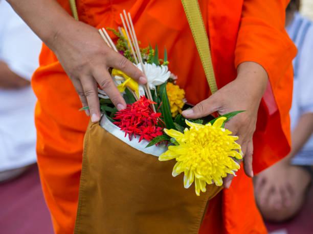 istock Offer sacrifice flowers to monk 654171698