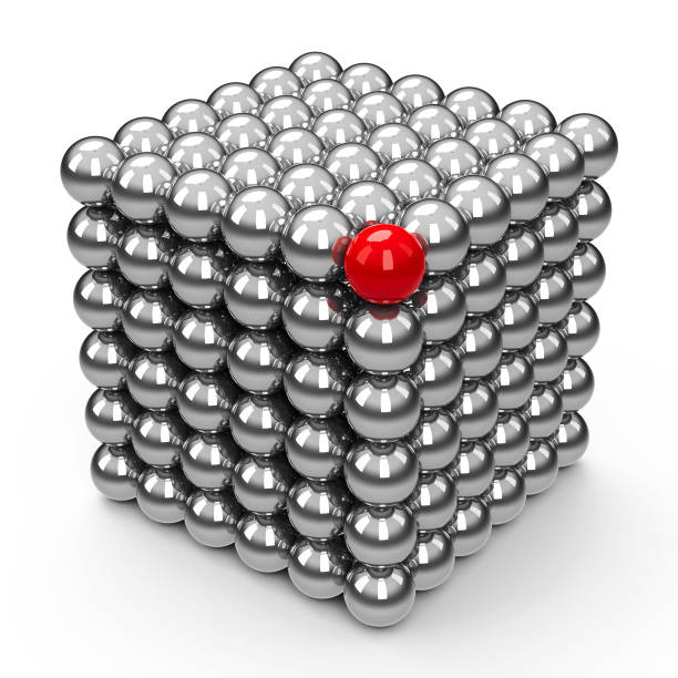 The Neocube spheres with red sphere The neodymium magnet toy with red different element - isolated on a white - represents individuality and leadership, three-dimensional rendering, 3D illustration chromium element periodic table stock pictures, royalty-free photos & images