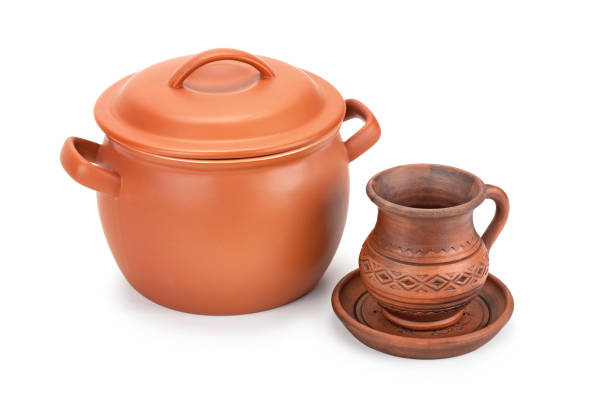 istock clay pot, jug and saucer isolated on white background 654178104